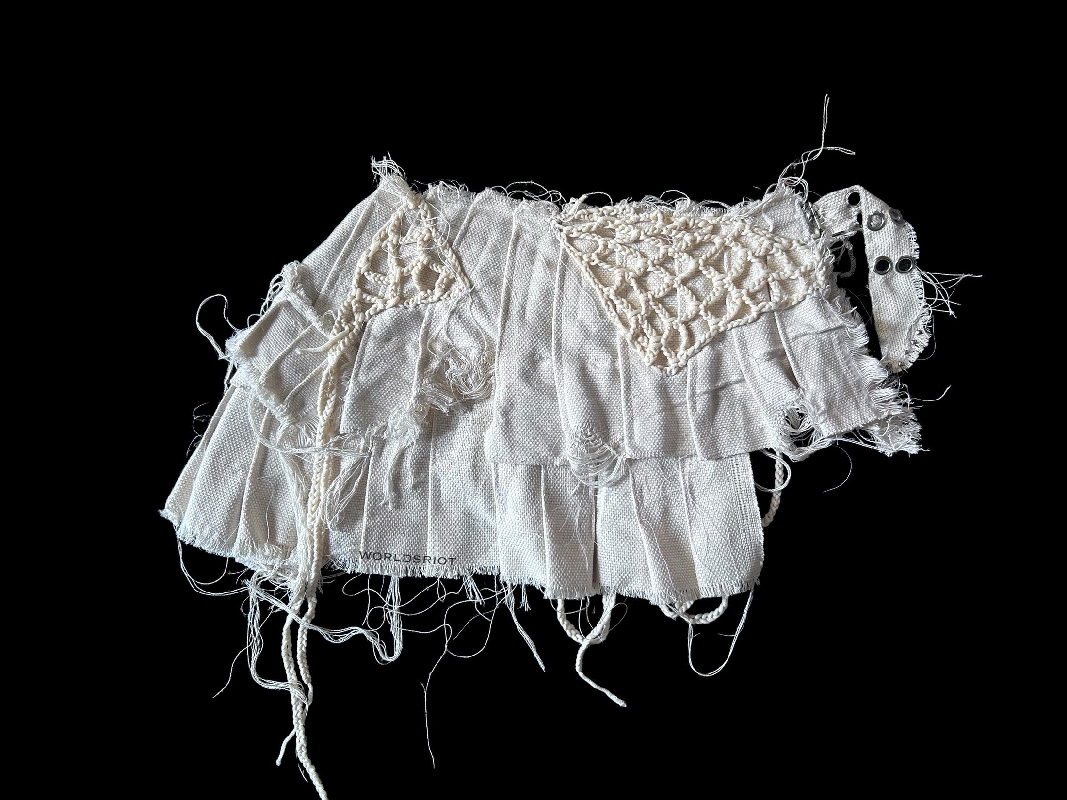 RIOT PLEATED MINI SKIRT